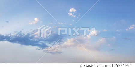 Soft blue  sky has the light of the sun and small clouds, weather background 115725792