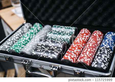 Close-Up of Poker Chips Set in Case 115725999