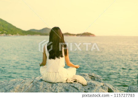 Woman Looking at the Sunset 115727783