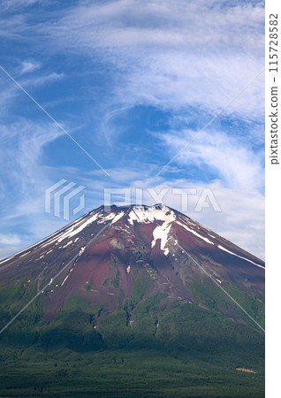 The summit of Mt. Fuji as seen from Oshino Village, Yamanashi Prefecture 115728582