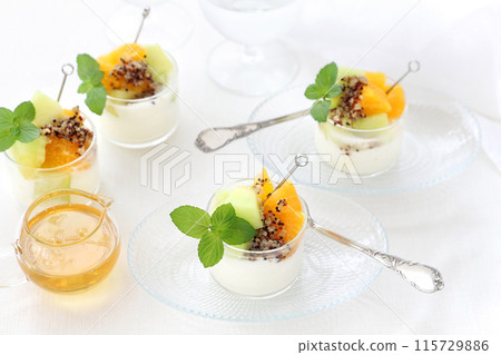 Yogurt topped with quinoa and fruit Yogurt topped with quinoa and fruit 115729886