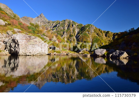 Autumn at Hyoga Park, Mount Yari reflected in Tengu Pond 115730379