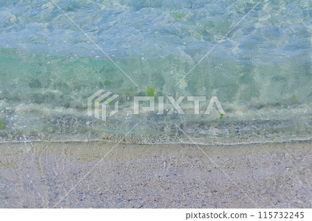 Clear emerald green sea, beautiful sand, small waves 115732245