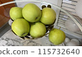 Fruit plate on glass table, bowl with green and ripe apples, natural products 115732640