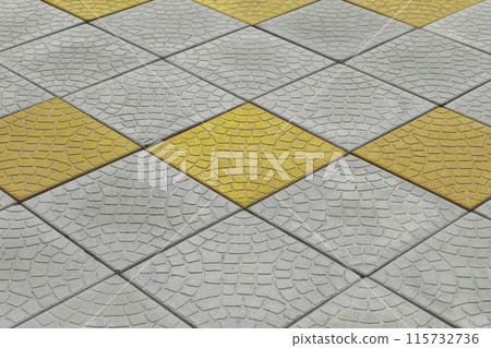 Diagonal pattern grey and yellow paving slabs floor road surface street city background texture tile Diagonal pattern grey and yellow paving slabs floor road surface street city background texture tile 115732736