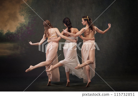 Poetry ballet. Rear view photo of charming, graceful girls dancing against vintage studio background. Poetry ballet. Rear view photo of charming, graceful girls dancing against vintage studio background. 115732851