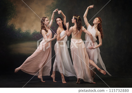 Harmony. Elegant ballerinas in pastel dresses perform delicate and graceful dance against vintage studio background. 115732880