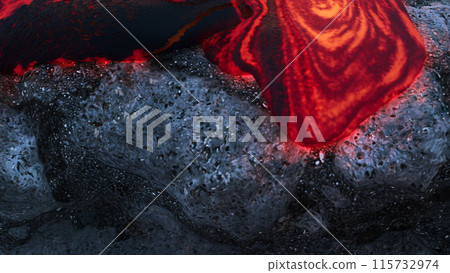 Molten Lava Flow on Solidified Lava Rocks 115732974