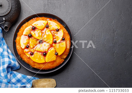 Sweet cake with orange slices and berries Sweet cake with orange slices and berries 115733033