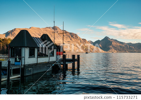 Queenstown waterfront with wooden dock and mountain on Lake Wakatipu at New Zealand 115733271