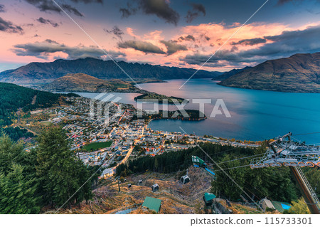 Beautiful sunset sky over illuminated Queenstown with Lake Wakatipu at New Zealand Beautiful sunset sky over illuminated Queenstown with Lake Wakatipu at New Zealand 115733301