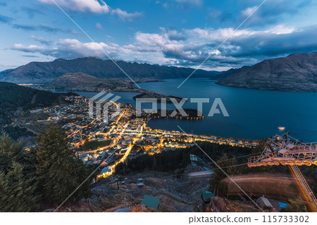 Beautiful sunset sky over illuminated Queenstown with Lake Wakatipu at New Zealand 115733302