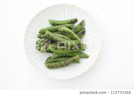 Roasted napkins on white plate top view 115733368