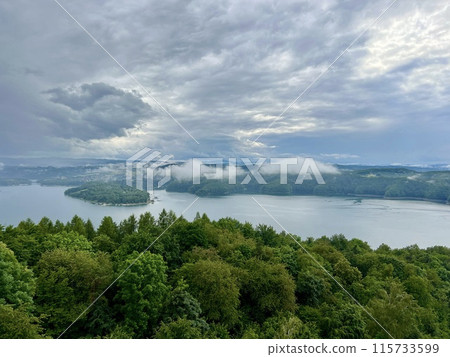 Lake Solina is a largest in Poland water reservoir surrounded by a characteristic landscape of mountains covered with forest and plenty of beaches with tourist infrastructure. Lake Solina is a largest in Poland water reservoir surrounded by a characteristic landscape of mountains covered with forest and plenty of beaches with tourist infrastructure. 115733599