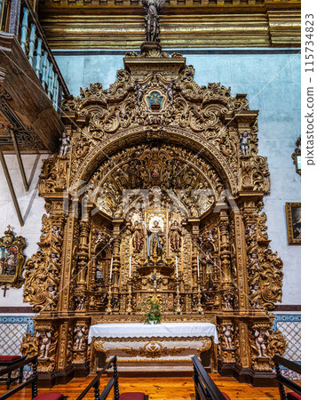 The intricate golden interior of the Carmelite church Igreja do Carmo in the old town of Faro in Portugal The intricate golden interior of the Carmelite church Igreja do Carmo in the old town of Faro in Portugal 115734823