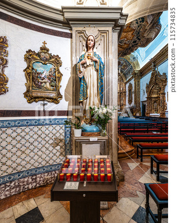 The intricate golden interior of the Carmelite church Igreja do Carmo in the old town of Faro in Portugal The intricate golden interior of the Carmelite church Igreja do Carmo in the old town of Faro in Portugal 115734835