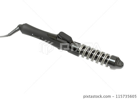 Black curling iron on white background Black curling iron on white background 115735605