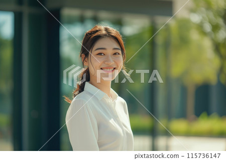 Corporate Triumph: Woman Posing Proudly by Her Park Office Corporate Triumph: Woman Posing Proudly by Her Park Office 115736147