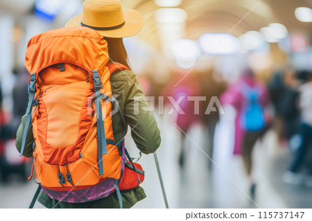 Jetsetter Chic: Young Woman with Backpack in Terminal 115737147
