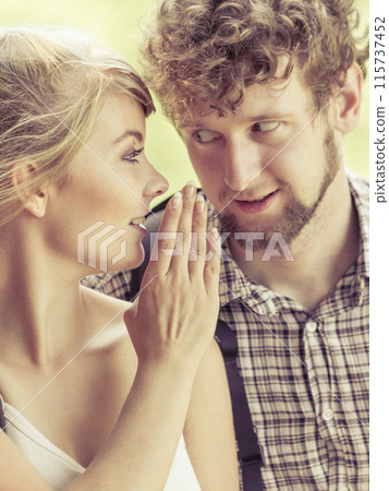 Woman telling her boyfriend some secrets Woman telling her boyfriend some secrets 115737452