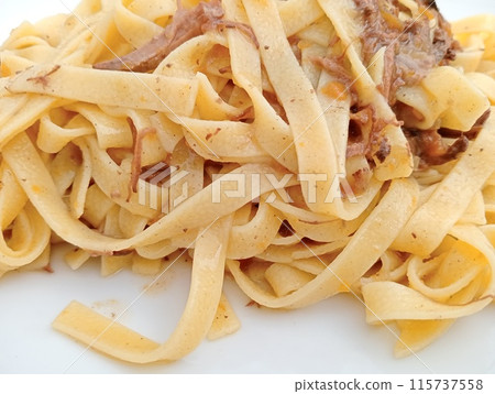 close up of noodles with venison sauce and vegetables close up of noodles with venison sauce and vegetables 115737558