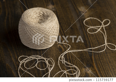 a spool of light thread for sewing a spool of light thread for sewing 115739177