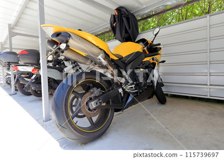Motorcycles in the parking lot Motorcycles in the parking lot 115739697