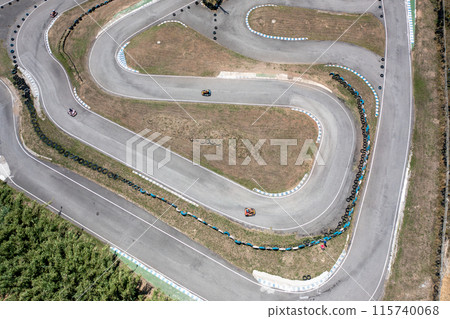Aerial view of kart race track with karting cars 115740068