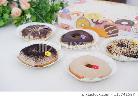 donuts with delicious topping as a background 115741587