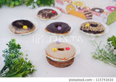 donuts with delicious topping as a background donuts with delicious topping as a background 115741610