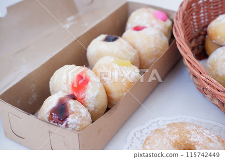 flavored ball donuts as a background flavored ball donuts as a background 115742449