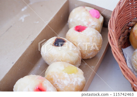 flavored ball donuts as a background 115742463