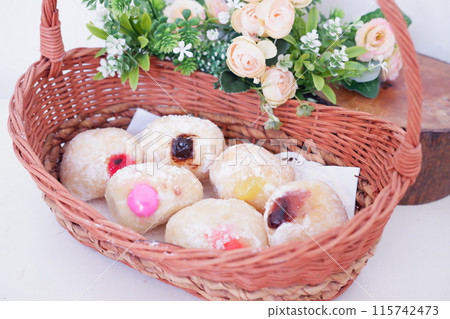 flavored ball donuts as a background 115742473