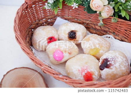 flavored ball donuts as a background 115742483