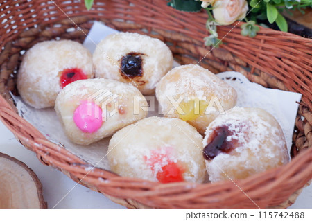 flavored ball donuts as a background 115742488