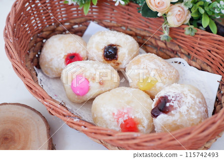 flavored ball donuts as a background flavored ball donuts as a background 115742493