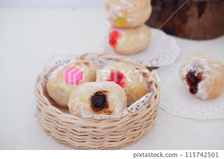 flavored ball donuts as a background flavored ball donuts as a background 115742501