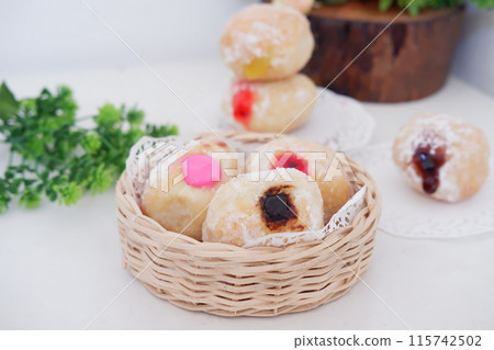 flavored ball donuts as a background 115742502