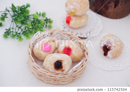 flavored ball donuts as a background flavored ball donuts as a background 115742504