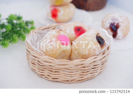 flavored ball donuts as a background flavored ball donuts as a background 115742514