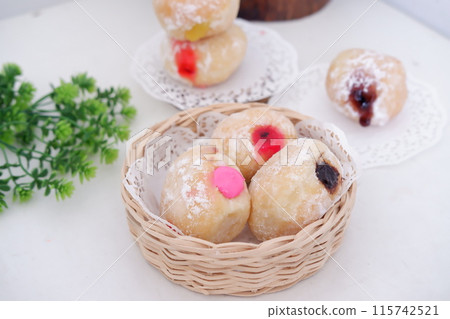 flavored ball donuts as a background 115742521