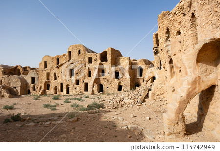 Ancient stone ruins in town of Tatouine. Ksar Mgabla closest Ksar to Tataouine, Tunisia Ancient stone ruins in town of Tatouine. Ksar Mgabla closest Ksar to Tataouine, Tunisia 115742949