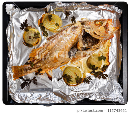 Fried palometa fish on foil - Mediterranean delicacy Fried palometa fish on foil - Mediterranean delicacy 115743631