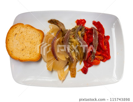 Festive and everyday vegetable dish of Catalan cuisine is escalibada with salted anchovies Festive and everyday vegetable dish of Catalan cuisine is escalibada with salted anchovies 115743898