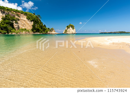 Paradisiacal beach lagoon with shallow, crystal-clear waters. Iriomote island, Okinawa. Paradisiacal beach lagoon with shallow, crystal-clear waters. Iriomote island, Okinawa. 115743924