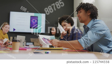 Image of data processing over diverse colleagues having meeting in office Image of data processing over diverse colleagues having meeting in office 115744338
