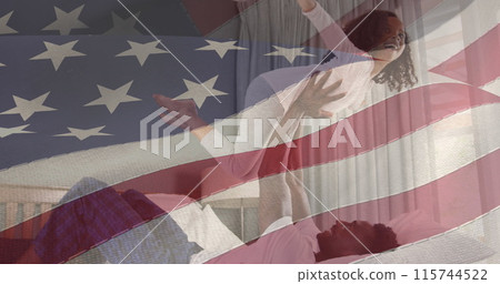 Image of flag of united states of america over african american father and daughter having fun Image of flag of united states of america over african american father and daughter having fun 115744522