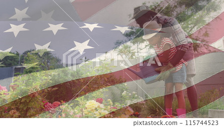 Image of flag of united states of america over african american father and daughter gardening 115744523