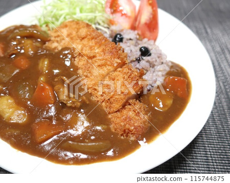 A delicious plate of millet rice and pork cutlet curry 115744875