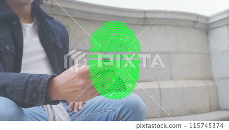 Image of fingerprint over biracial man using smartphone Image of fingerprint over biracial man using smartphone 115745374
